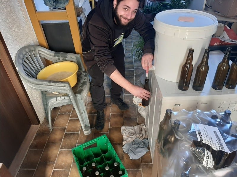 Bottling beer from a spigot with a pipe